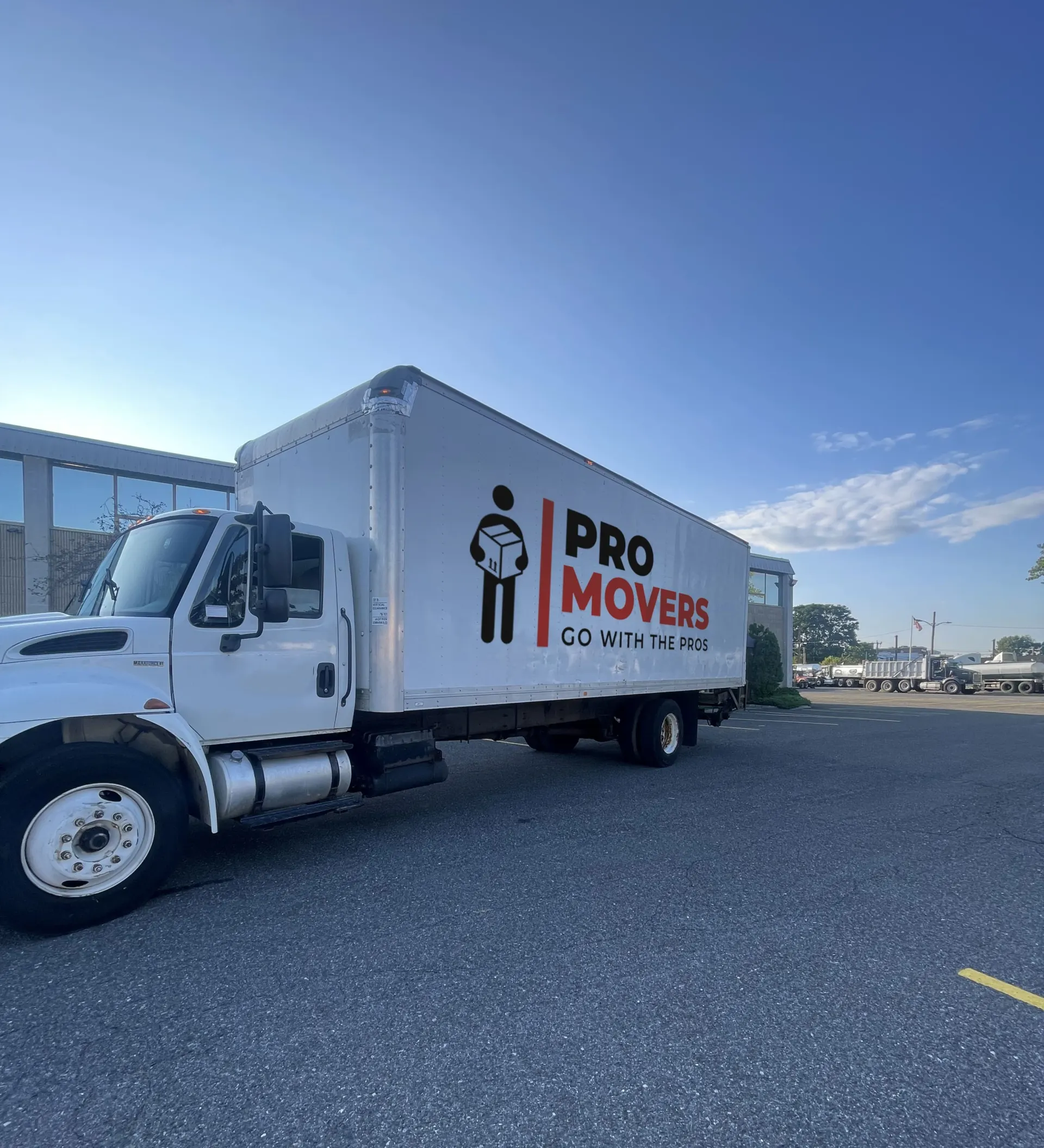 Pro Movers' truck parked in a parking lot